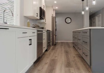 side view of kitchen sink with stove-Kamloops Kitchen Studio